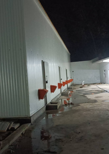 high-tech mushroom farm with climate control, racks and automation system