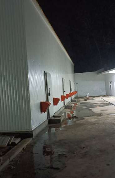 high-tech mushroom farm with climate control, racks and automation system